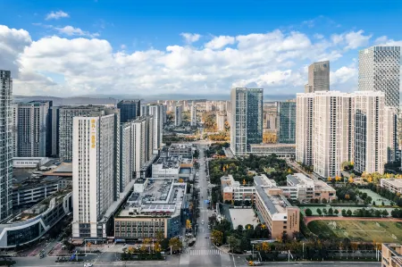 Yipin Hotel (Kunming South Railway Station Chenggong University Town) Отели рядом с достопримечательностью «Yunnan Minzu University (Yuhua Campus)»