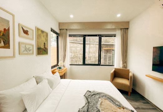 망고 아파트먼트 주방 및 침실