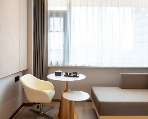 Elong Anyue Hotel (Zhangjiagang Mambat Plaza Yangshe Old Street) الغرف Photos