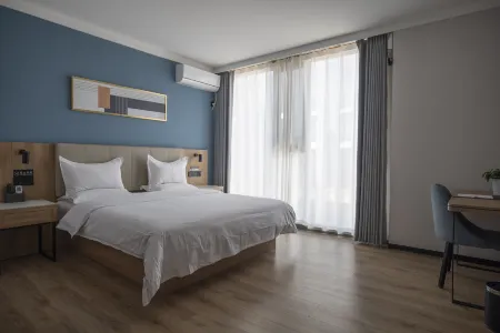 Shell Hotel (People's Hospital) Отели в г. Дайсянь