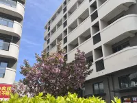 Beidaihe Yunduo Shiguang Boutique Apartment (Xinglong Guangyuan Complex) Hotels in Exceptional Garden