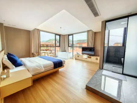 July Wild Luxury Resort · Puzhehei Отели рядом с достопримечательностью «Fairy Cave»