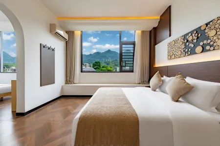 Westyard Lodge.Libo Отели рядом с достопримечательностью «Libo Zhangjiang Scenery Spot Management Office»