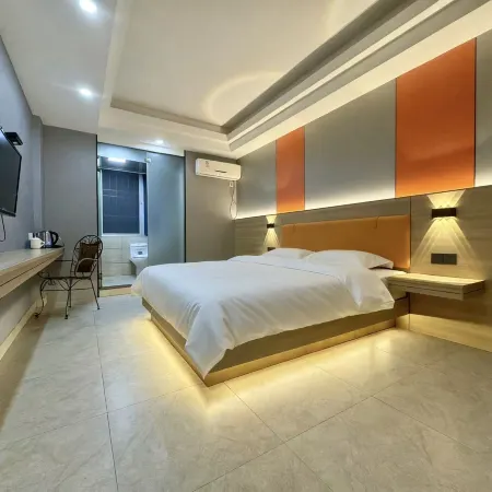 Shixing Xinjia Business Hotel