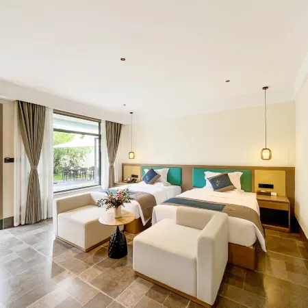 Songfengju Courtyard Hotel (Xingyi Wanfenglin Airport & High-speed Railway Station Branch)