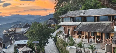 Yunhai Bojing Chinese Inn Отели рядом с достопримечательностью «The Old Bulang Ethnicity Village of Wenji»