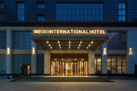 Meixi International Hotel Отели рядом с достопримечательностью «Zhang Zhongjing Memorial Temple»