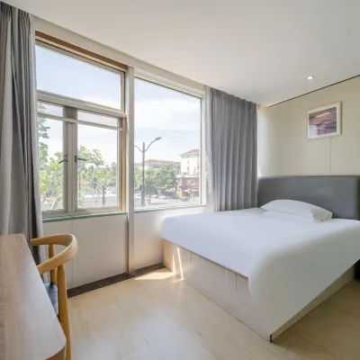 Dexin Hotel (Shanghai South Railway Station Shilong Road) Отели рядом со станцией Shanghai South жд вокзал