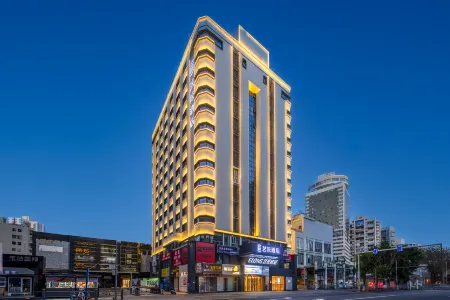 ELong Hotel (HaiKou International Trade Center Store) Отели рядом с достопримечательностью «Hainan University(Haidian Campus)»