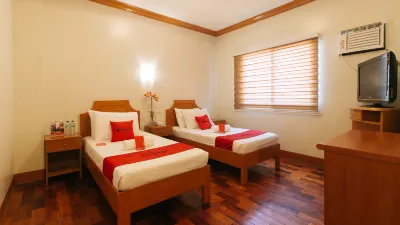 RedDoorz Premium @ Nick Hotel Gerona Tarlac Hotel in zona Saipan Beach