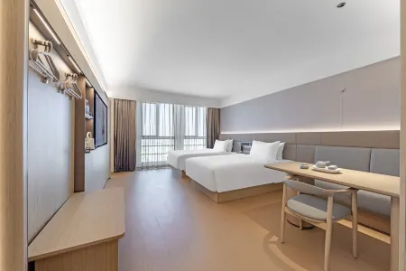 JI Hotel (Shanghai Wildlife Park Huinan Subway Station) Отели рядом с достопримечательностью «Shanghai Industry and Commerce Foreign Language College South Campus»