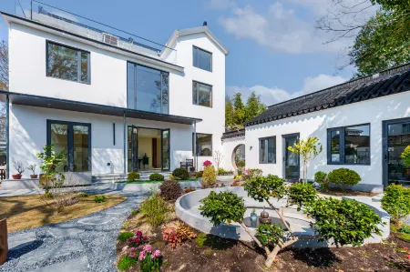 Sister Zhou's Guest House Отели рядом с достопримечательностью «Ботанический сад Цзяньнан»