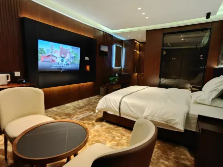 Zadoi Zhenxing Grand Hotel Отели в г. Цзадо