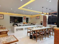 James Joyce Coffetel (Zhumadian Zhengyang Mingmen Wangxuan Branch) Hotels in Zhengyang