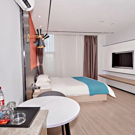 Meidashangpin Hotel (Huichang Bus Station Sunshine Auto City)