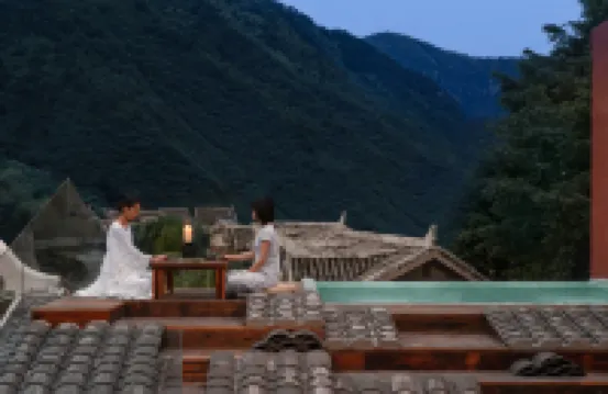 Jiuzhaigou · Mistshroud Mountains & Sunset Glow Snowscape · Sukoon Village Hotels near Bonsai Ford