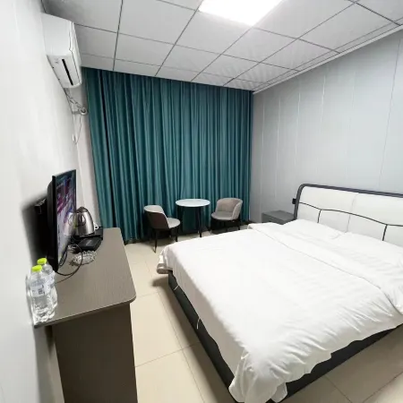 Xinyu Business Hotel (Linyi Jinqueshan Road Branch)