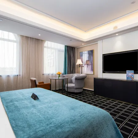 Xana Deluxe Hotel Отели в г. Цзяочжоу