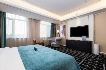 Xana Deluxe Hotel Отели в г. Цзяочжоу
