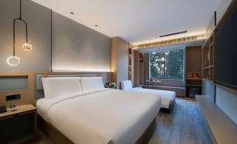 Yiwang Hotel (Shuangyu Passenger Transport Center Wenjin Road)