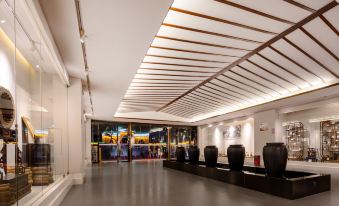 Maoming Nanyue Impression Hotel (1959 Wenchuang Street High Speed Railway Station)