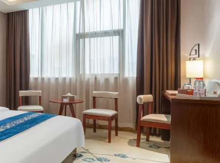 Ouyi Hotel(Duyun Wanda Plaza Teachers College Store) Отели рядом с достопримечательностью «Duyun Garden Expo Park»