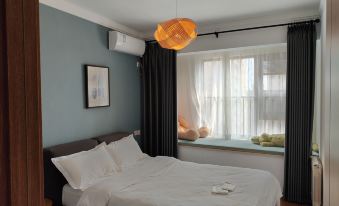 Kobe Fan Homestay (Xinmi ENJOY.LAND)