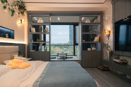 Floral Hotel·Free Travel Beach Hotel (Evergrande Golden Beach Branch) Отели рядом с достопримечательностью «Tangdao Bay Coastal Park»