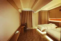 Lifei Hotel Hôtels à : Bannière arrière de Hanggin