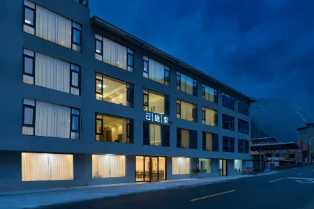 Wolong Yunyinli Homestay Отели рядом с достопримечательностью «Wolong Town»