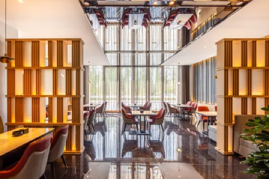 Jinyi Hotel (Erenhot Municipal Government) Отели в г. Эрэн-Хото