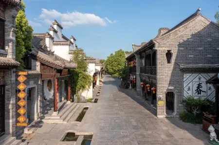 Jiuhe Chuxin Inn Отели рядом с достопримечательностью «Taierzhuang Ancient Town»