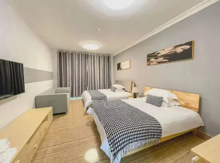 Huajing Seaside Holiday Apartment Отели рядом с достопримечательностью «Loong Bay International Ocean Resort»