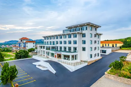 Rongcheng Chengshantou Xixiakou Zoo Rezen Select Hotel Отели в г. Жунчэн