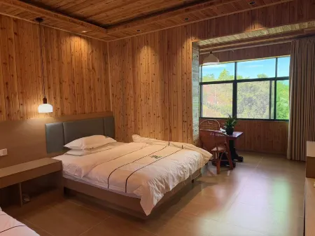 Pu'er Chashan Diary Homestay Отели рядом с достопримечательностью «Rhino Land of The Pu'Er National Park»