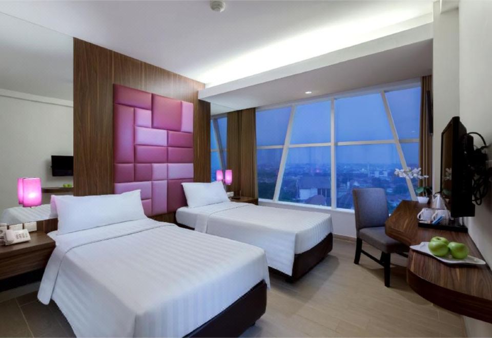 퀘스트 호텔 다르모 - 수라바야 객실