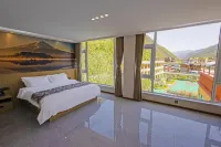 Jidirenjia Hotel Hôtels à : Zhouqu