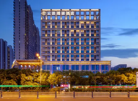 Fuyang Yunbo Manju Hotel (Yingzhou Wanda Plaza Long Distance Bus Station Store) Отели рядом с достопримечательностью «Fuyang Shuangqingwan Park»