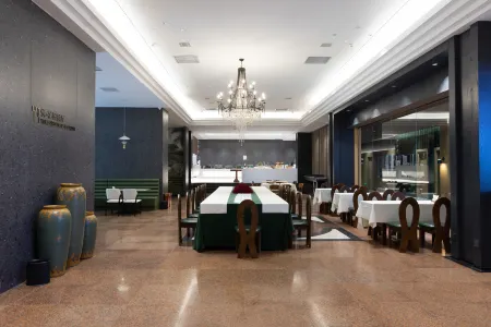 HABITATA · HOLIDAY HOTEL Отели рядом с достопримечательностью «Nvzi University Library»