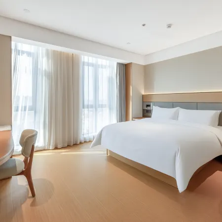 Qingdao Quanyi Hotel (Xinduxin Qingjiang Road Metro Station Branch)