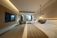 Qiaoxiang Retu Hotel (Yuanjiang Station)