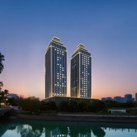 Olympic Twin Towers Hotel（Gengwen Road Metro Station Store） Отели рядом с достопримечательностью «Река Фучуньцзян»