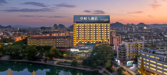 Guiyu Hotel (Guilin Elephant Trunk Mountain & Guilin Railway Station Branch) Отели в г. Гуйлинь