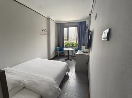 Yecheng County Starting Hotel (219 County 0 km starting point) Отели в г. Каргалык