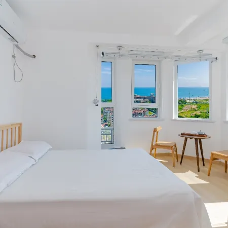 Yijia B&B (Qingdao Jinshatan Branch) Отели рядом с достопримечательностью «Пляж Голден-Бич»