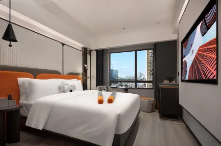 Do A Land V Hotel (xingshaZhongmao City) Отели рядом с достопримечательностью «Hunan Engineering Polytechnic»