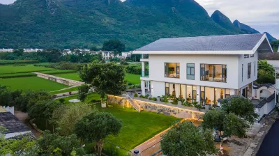 Xingyi Yundanfengqing Homestay Отели в г. Синъи