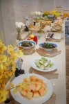 Vienna International Hotel - servizio colazione