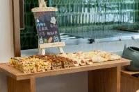 アトゥールホテル 伊寧広仁郡 - 朝食