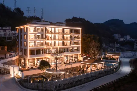 Enshi Qilihuajian Homestay Отели рядом с достопримечательностью «Hubei Enshi College»